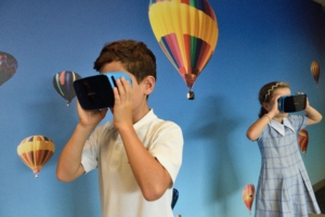 Two children using virtual reality