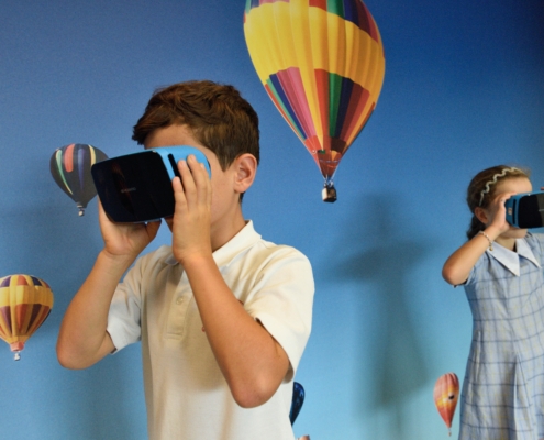 Two children using virtual reality