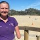 Abby Vidler, a 17-year-old with no forearms, smiles happily at the camera